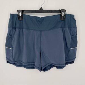 Athleta Blue Ready Set Go Athletic Shorts Womens L Pockets Split Hem Drawstring
